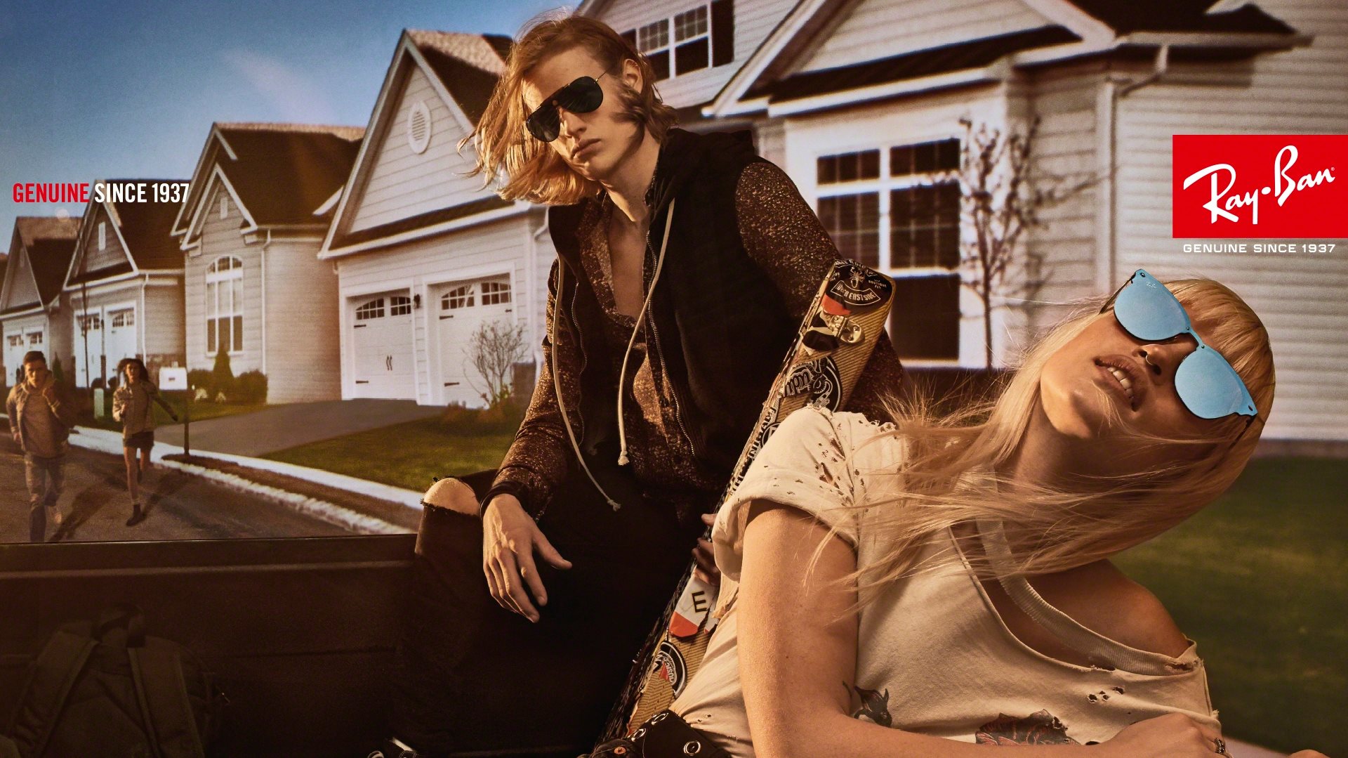 Ray-Ban official store exterior featuring the iconic red logo and a wide selection of sunglasses on display.